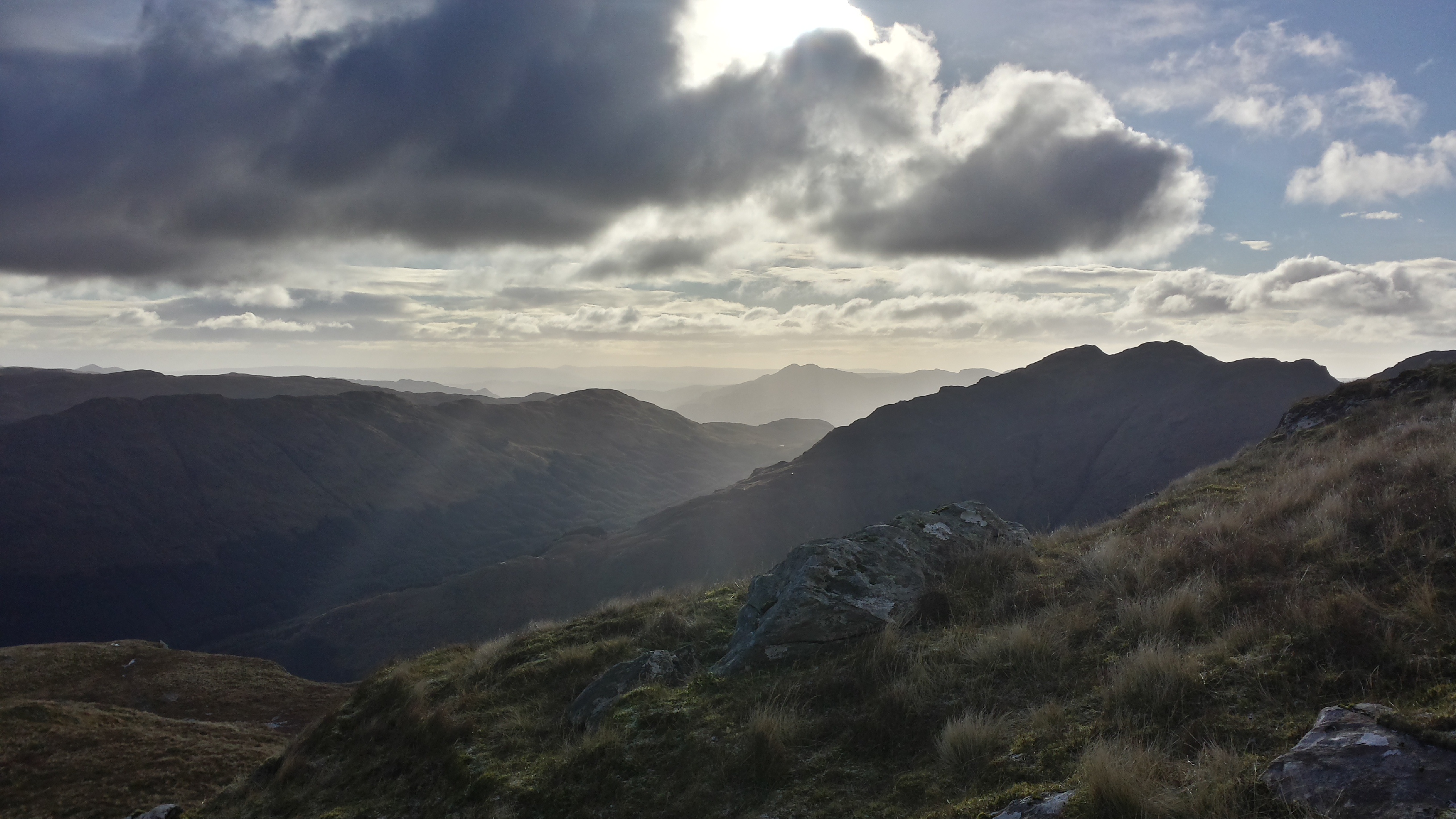 Scottish mountains with rays of sunlight